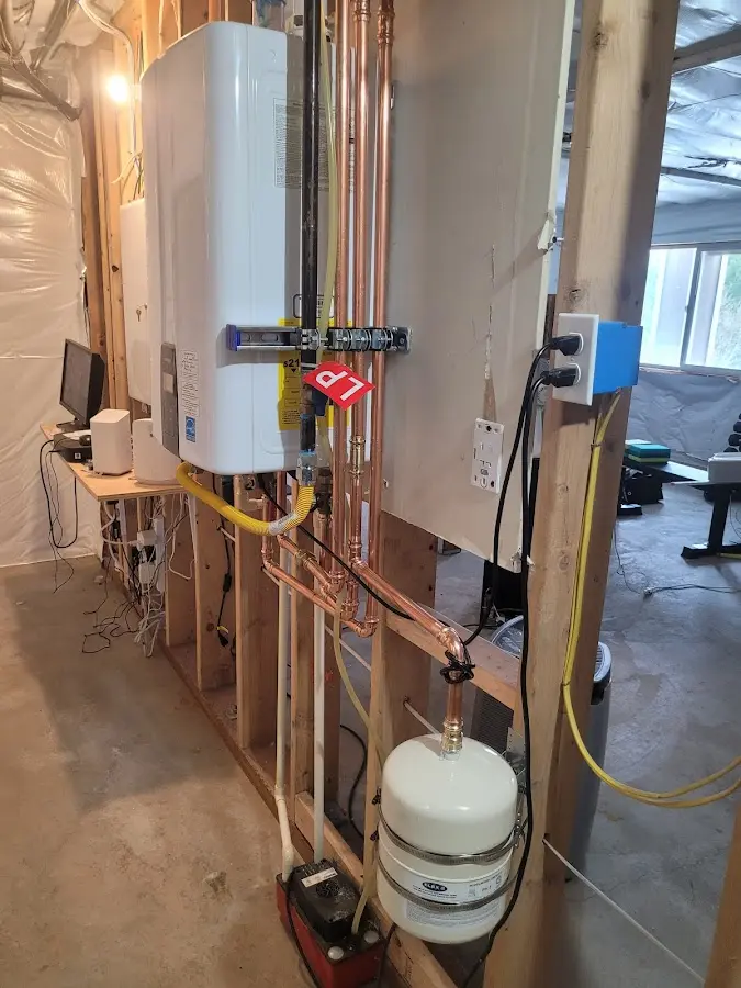 Licensed plumber repairing a kitchen sink in Mount Kisco